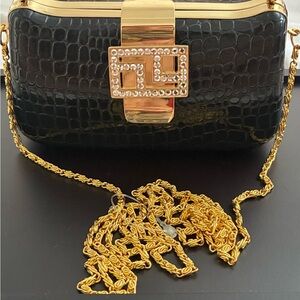 Elegant Black and Gold Clutch Bag